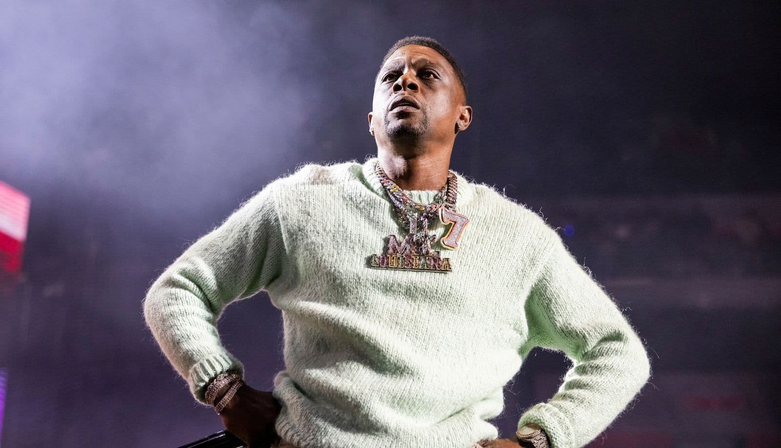 Boosie Badazz performs onstage during a live music event.