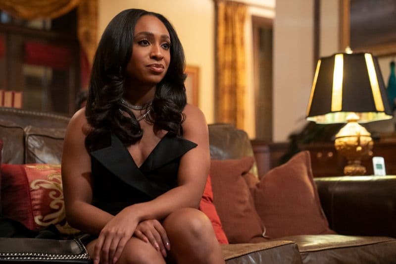 Taylor Polidore Williams as Kimmie sits in Beauty in Black Season 3.